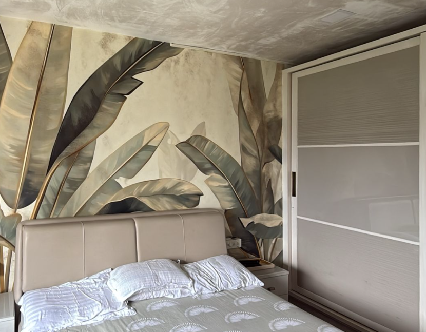 Clean bright bedroom with fresh bed and wardrobe after home deep cleaning